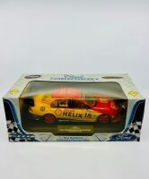 FORD: A 1:18 scale model by Classic Carlectables of the #18 Shell Helix Racing Ford AU Falcon driven by Paul Radisich in the 2000 V8 Supercars season, limited edition 1978/5000, complete with original packaging and certificate of authenticity. [Location: - 7