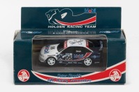 BROCK: A 1:43 scale Classic Carlectables Peter Brock's HRT Racing VS Commodore, boxed, with roof signed by Peter Brock