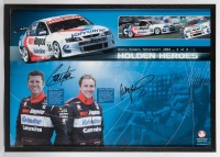 GARRY ROGERS: A framed and glazed poster 'Garry Rogers Motorsport 2004', signed by Cameron McConville and Garth Tander, measures 43.5cm high, 62cm wide.