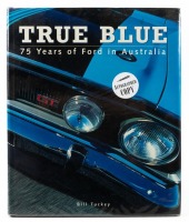 FORD: A hardcover edition of 'True Blue -75 Years of Ford in Australia' by Bill Tuckey, signed by ten drivers including Dick Johnson, Craig Lowndes, Steven Richards, Fred Gibson, John Bowe and five others