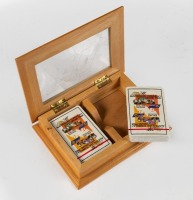AGP: Two decks of 'Australian Formula 1 Grand Prix - Adelaide South Australia' playing cards, presented in a wooden box