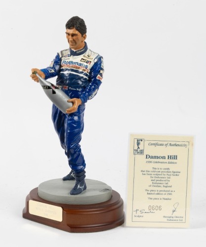 HILL: A 1:9 scale limited edition (0606/2500) cold cast porcelain resin figure of Damon Hill sculpted by Paul Szeiler for Endurance Ltd, on wooden base, NIB and accompanied by a COA from The Art of Sport, 22cm high
