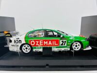 FORD: A 1:18 scale model by Biante of the #21 BJR OzEmail Racing Ford BA Falcon driven by Brad Jones in the 2004 V8 Supercars season, limited edition, 0087/1000, complete with original packaging and certificate of authenticity [Location: Sydney] - 2
