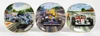 PLATES: A group of three decorative dinner plates each depicting Formula 1 scenes from the Australian GP in Adelaide, all 20cm in diameter