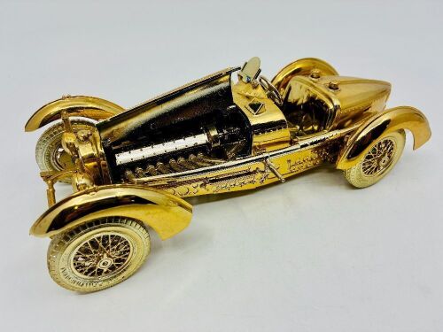 369 · BUGATTI: A 1:18 scale model by Burago of the Bugatti Type 59 that has been painted gold [Location: Sydney]