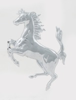 BADGE: A Ferrari pressed metal 'Cavallino Rampante' badge [Location: Melbourne]