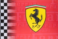FERRARI: A large stretched fabric canvas featuring the Scuderia Ferrari 'Cavallino Rampante' prancing horse emblem, 91cm high, 136cm [Location: Melbourne]