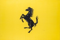 FERRARI: A large streched fabric canvas featuring the Ferrari 'Cavallino Rampante' prancing horse, 91cm high, 136cm wide [Location: Melbourne]
