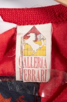 FERRARI: A red coloured padded vest with 'Galleria Ferrari' emblem to left side, made by Canadians (Italy), two pockets, size unknown (appears large) [Location: Melbourne] - 2