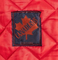 FERRARI: A red coloured padded vest with 'Galleria Ferrari' emblem to left side, made by Canadians (Italy), two pockets, size unknown (appears large) [Location: Melbourne] - 3