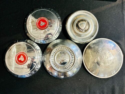 HOLDEN: A group of five various Holden hubcaps [Location: Sydney]