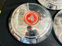 HOLDEN: A group of five various Holden hubcaps [Location: Sydney] - 5
