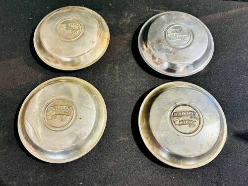 CHRYSLER: Four hubcaps for the Chrysler Six [Location: Sydney]