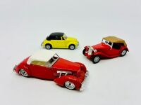 MATCHBOX: Two Matchbox Models of Yesteryear 1:43 scale models including a 1945 MG TC and a 1937 Cord 812 as well as a 1:43 scale VW Beetle Cabriolet by Polistil, all in original packaging [Location: Sydney]