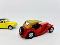 MATCHBOX: Two Matchbox Models of Yesteryear 1:43 scale models including a 1945 MG TC and a 1937 Cord 812 as well as a 1:43 scale VW Beetle Cabriolet by Polistil, all in original packaging [Location: Sydney] - 5