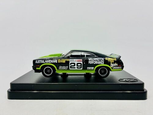 79 · FORD: A 1:43 scale model by Trax of the Ford XC Falcon Hardtop driven by Garry Willmington and Phil Barnes in the Hardie Ferodo 1000, complete with display case [Location: Sydney]