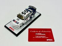 HOLDEN: A 1:43 scale model by Biante of the HRT #05 Holden VR Commodore, driven by Peter Brock and Tomas Mezera in the 1995 Tooheys 1000, limited edition 0031/1008 complete with display case and certificate of authenticity [Location: Sydney]