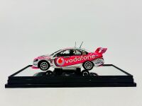 FORD: A 1:43 scale model by Classic Carlectables of the Team Vodafone #1 Ford FG Falcon, 2009 championship winner driven by Jamie Whincup, limited edition 1387/1550, complete with display case and certificate of authenticity [Location: Sydney] - 2