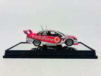 FORD: A 1:43 scale model by Classic Carlectables of the Team Vodafone #1 Ford FG Falcon, 2009 championship winner driven by Jamie Whincup, limited edition 1387/1550, complete with display case and certificate of authenticity [Location: Sydney] - 5