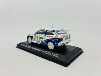 FORD: A 1:43 scale model by IXO of the #7 Ford Escort Cosworth, driven by T.Makinen in the 1994 1000 Lakes Rally [Location: Sydney] - 4
