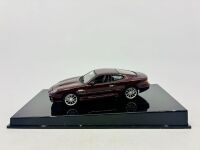 ASTON MARTIN: A 1:43 scale model by Autoart of the Aston Martin DB7, complete with original packaging [Location: Sydney]