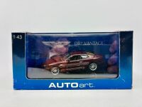 ASTON MARTIN: A 1:43 scale model by Autoart of the Aston Martin DB7, complete with original packaging [Location: Sydney] - 7