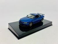NISSAN: A 1:43 scale model by Autoart of the Nissan Skyline R34 GTR , complete with original packaging [Location: Sydney] - 2