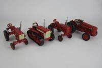 TRACTOR MODELS: Four International Harvester die-cast tractor and crawler