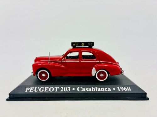 332 · PEUGEOT: A 1:43 scale model by IXO of the Peugeot 203 Casablanca Taxi with display case. [Location: Sydney]