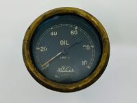 JAEGER OIL GAUGE: A British Jaeger oil pressure gauge, white markings on black face and brass bezel, 55mm diameter - 2