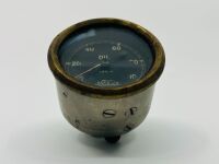 JAEGER OIL GAUGE: A British Jaeger oil pressure gauge, white markings on black face and brass bezel, 55mm diameter - 3