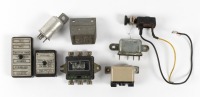 FUSES: A group of assorted Ferrari fuses & fuse box covers [Location: Melbourne]