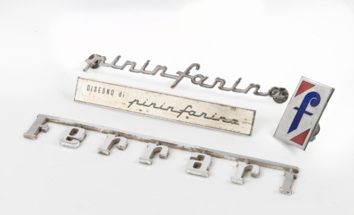 BADGES: A group of four Ferrari / Pininfarina badges [Location: Melbourne]