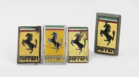 BONNET BADGES: A group of four Ferrari bonnet badges [Location: Melbourne]