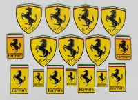 FERRARI: A group of modern Ferrari stickers, along with two modern plaques, 8cm high, 5cm wide [Location: Melbourne]