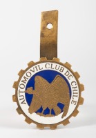 CHILE: An enameled Automovil Club De Chile brass grille badge, with mounting bracket, measures 8.5cm in diameter [Location: Melbourne]