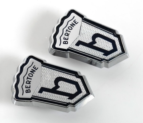 BERTONE: A pair of plastic Bertone 'B' body badges, measures approx 4.5cm high each [Location: Melbourne]