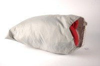 CAR COVER: A large red car cover made by Form Fit / Covercraft understood to have been used on a modern Ferrari in bag [Location: Melbourne]