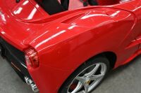 FERRARI: A Rastar childrens electric ride-on Ferrari car, with remote control option for parents, 1.2m long, 60cm wide [Location: Melbourne] - 12