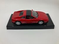 FERRARI: A group of three models including a 348 ts by Maisto, Testarossa and F40 by Burago - 3
