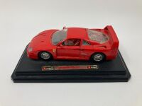 FERRARI: A group of three models including a 348 ts by Maisto, Testarossa and F40 by Burago - 7