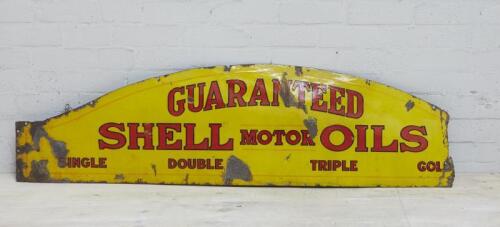 SHELL: An original 'Guaranteed Shell Motor Oils' oil bay single sided enamel sign, 43 cm high, 156cm wide