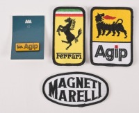 PATCHES & BADGE: Three cloth patches, including Ferrari, Agip, Magneti Marelli, and an Agip badge [Location: Melbourne]