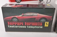 TESTAROSSA: Two 1980s 'Ferrari Formula' Testarossa Telephones, one in white, the other red. Boxed [Location: Melbourne] - 2