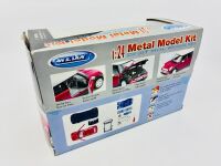 MINI COOPER: A 1:24 scale model kit by Welly of the Mini Cooper, complete with original packaging [Location: Sydney] - 3