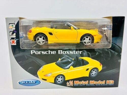 342 · PORSCHE: A 1:24 scale model kit by Welly of the Porsche Boxter, complete with original packaging [Location: Sydney]