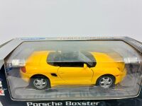 PORSCHE: A 1:24 scale model kit by Welly of the Porsche Boxter, complete with original packaging [Location: Sydney] - 2