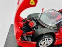 FERRARI: A 1:18 scale model by Maisto of the Ferrari F50, complete with original packaging. [Location: Sydney] - 6
