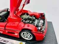 FERRARI: A 1:18 scale model by Maisto of the Ferrari F50, complete with original packaging. [Location: Sydney] - 8