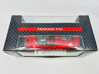FERRARI: A 1:18 scale model by Maisto of the Ferrari F50, complete with original packaging. [Location: Sydney] - 9